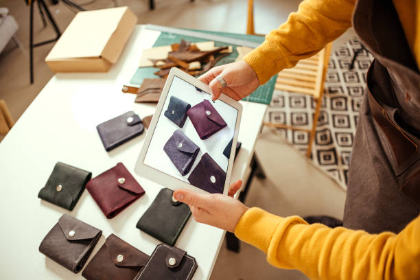 Man takes photos of wallets he made himself